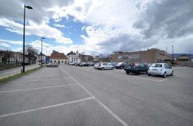 Le nouveau bâtiment qui abritera, entre autres, le centre commercial Manor, entraînera la disparition du parking de l’Ancien-Stand.